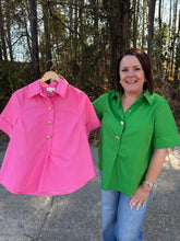 Load image into Gallery viewer, Solid short-sleeve top featuring front gold decorative button placket and collared neck.