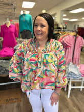 Load image into Gallery viewer, T22612 Printed v-neck long sleeve top featuring self-tie detail.