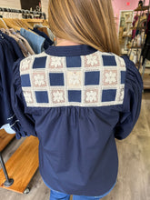 Load image into Gallery viewer, T24791 Solid 3/4 sleeve v neck top featuring crochet lace detail.