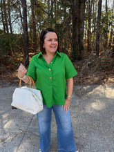 Load image into Gallery viewer, Solid short-sleeve top featuring front gold decorative button placket and collared neck.