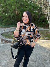 Load image into Gallery viewer, T21863 Printed mock neck long sleeve top featuring open back with self-tie at back neck.