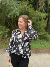 Load image into Gallery viewer, T21671 Printed v-neck long sleeve top featuring smocking at cuff