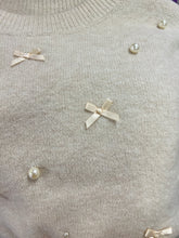 Load image into Gallery viewer, T24160 Solid knit short sleeve sweater top featuring bow and pearl embellishments.