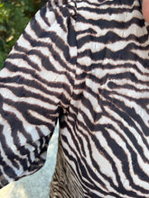 Load image into Gallery viewer, T21870 Animal print bubble sleeve v-neck top featuring swiss dot detail