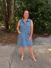 Load image into Gallery viewer, Solid collared sleeveless mini dress featuring front flap pockets with buckle accent.
