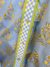 Load image into Gallery viewer, Floral print short puff sleeve top featuring contrast gingham binding at neckline, placket, and cuffs.