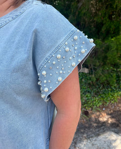 D23346 Solid denim round neck short sleeve mini dress featuring pearl detail at cuff.