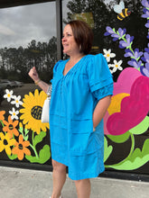 Load image into Gallery viewer, D22910 Solid v-neck puff sleeve mini dress featuring pleat detail. Button detail at front.