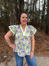 Load image into Gallery viewer, Floral print flutter sleeve top featuring contrast striped trim along neckline and sleeves.