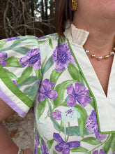 Load image into Gallery viewer, Floral print flutter sleeve top featuring contrast striped trim along neckline and sleeves.