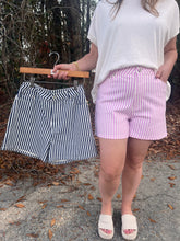 Load image into Gallery viewer, Striped shorts featuring belt loops and front button closure.