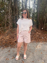 Load image into Gallery viewer, Leopard print high-waist shorts featuring front button and zipper closure.