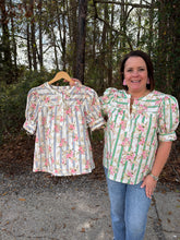 Load image into Gallery viewer, Botanical stripe print short puff sleeve top featuring self-tie cuff detail. Button closure at front. Round neckline.