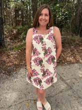 Load image into Gallery viewer, Floral print sleeveless mini dress featuring gold tone rose button detail at front.