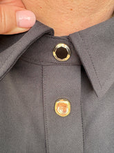 Load image into Gallery viewer, Solid sleeveless mini dress featuring button closure at front.