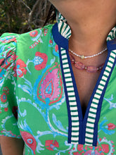 Load image into Gallery viewer, Botanical print short puff sleeve top featuring ruffled accent