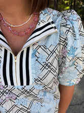 Load image into Gallery viewer, Floral plaid print short puff sleeve top featuring striped zip placket