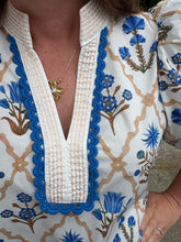 Load image into Gallery viewer, Floral print short puff sleeve top featuring contrast stripe trim and scallop accent at neckline and cuffs.