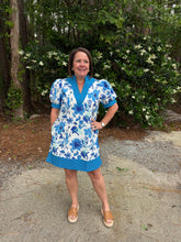 Load image into Gallery viewer, Floral print short puff sleeve pullover mini dress featuring stitch accent contrast band.