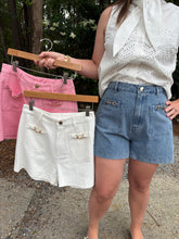 Load image into Gallery viewer, Solid high-waisted shorts featuring front patch pockets with gold horsebit detail.
