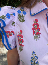 Load image into Gallery viewer, Layered ruffle sleeves button down floral top with scallop edge, solid contrast biding.
