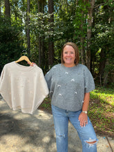 Load image into Gallery viewer, T24160 Solid knit short sleeve sweater top featuring bow and pearl embellishments.