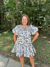 Load image into Gallery viewer, D24031 Floral print v-neck bubble sleeve mini dress featuring smock detail and self tie at neck.