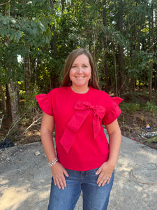 T24821 Solid short sleeve round neck top with bow detail
