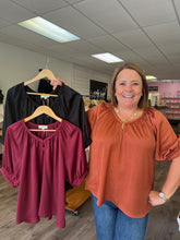 Load image into Gallery viewer, T24814 Solid satin v-neck half sleeve top featuring braided trim and cutout.