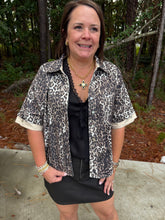 Load image into Gallery viewer, Short sleeves button down leopard top with solid contrast accent.