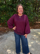Load image into Gallery viewer, Solid long balloon sleeve with lace trim detail at sleeve cuffs and hem