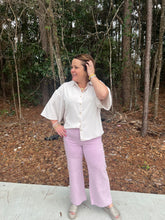 Load image into Gallery viewer, Solid collared 3/4 sleeve top featuring button up detail.