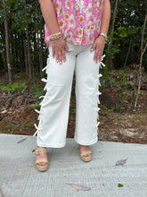 Load image into Gallery viewer, Cropped mid-rise denim jeans featuring fixed mini bows at side