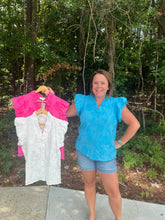 Load image into Gallery viewer, Solid cotton floral appliqué bubble flutter sleeve top featuring ruffle top