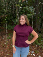Load image into Gallery viewer, Solid short sleeve mock neck top featuring pleated waist shaping