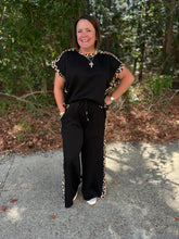 Load image into Gallery viewer, Solid jersey knit short sleeve top and pant set featuring leopard pattern contrast accent detailing.