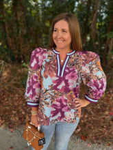 Load image into Gallery viewer, Floral print 3/4 puff sleeve top featuring contrast trim V-neck band and cuffs
