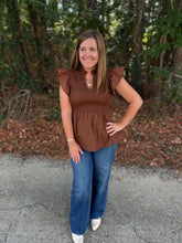 Load image into Gallery viewer, Solid flutter sleeve peplum top featuring smocked bodice