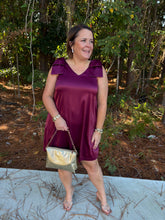 Load image into Gallery viewer, Solid sleeveless mini dress featuring bow detail at shoulders and V-neck. Side pockets.