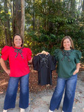 Load image into Gallery viewer, Solid puff sleeve top featuring embellished bow detail