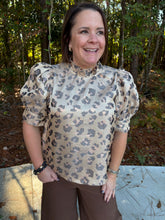 Load image into Gallery viewer, Animal print short puff sleeve top featuring ruffled mock neck