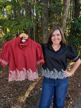 Load image into Gallery viewer, Embroidered smocked cuff band sleeve with embroidered border hem.
