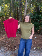 Load image into Gallery viewer, Solid mock neck sleeveless knit top featuring ribbed hem