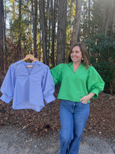 Load image into Gallery viewer, Solid 3/4 sleeve top featuring V-neck and pleated shoulder detail.