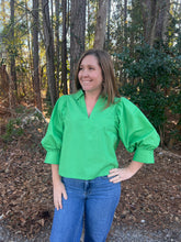 Load image into Gallery viewer, Solid 3/4 sleeve top featuring V-neck and pleated shoulder detail.
