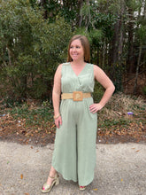 Load image into Gallery viewer, SY6232 SLEEVELESS SURPLICE WOVEN JUMPSUIT WITH SMOCKED WAIST AND BELT DETAIL