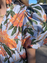 Load image into Gallery viewer, Floral print ruffled neck short puff sleeve midi dress featuring button closure at front