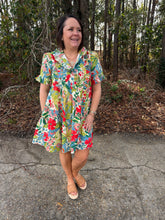 Load image into Gallery viewer, Floral print short sleeve mini dress featuring pleated ruffle trim at neckline and cuffs.