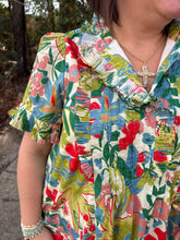 Load image into Gallery viewer, Floral print short sleeve mini dress featuring pleated ruffle trim at neckline and cuffs.