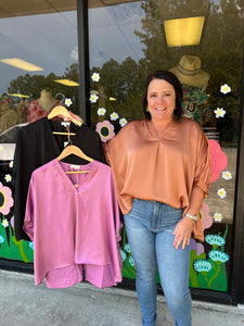 T19618 Satin v-neck 1/2 sleeve top featuring front placket detail